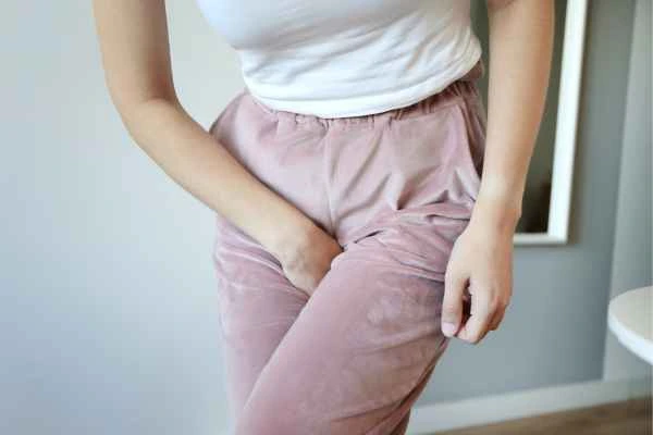 woman running for the toilet because of urinary incontinence Yateley